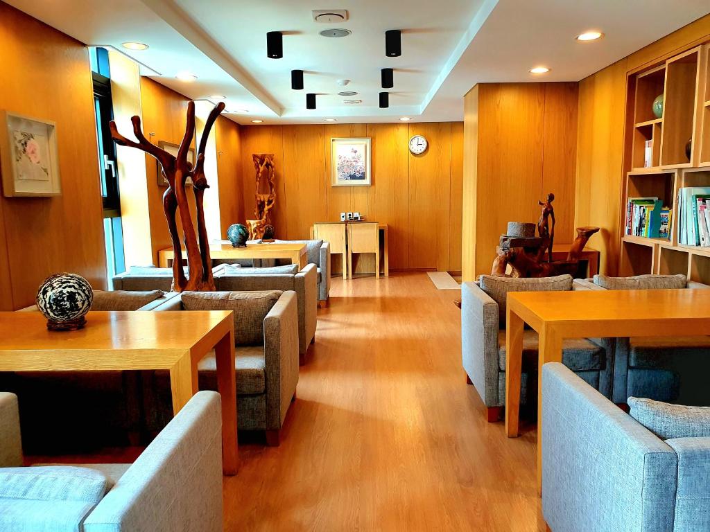 Posezení v ubytování Rian Hotel