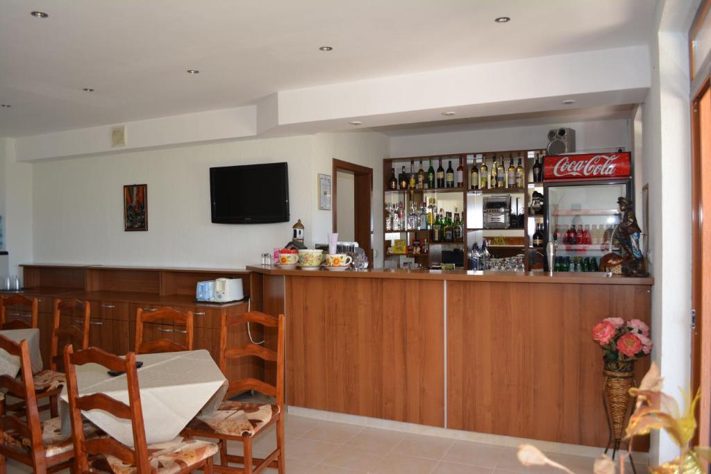 Lounge nebo bar v ubytování Hotel Genada