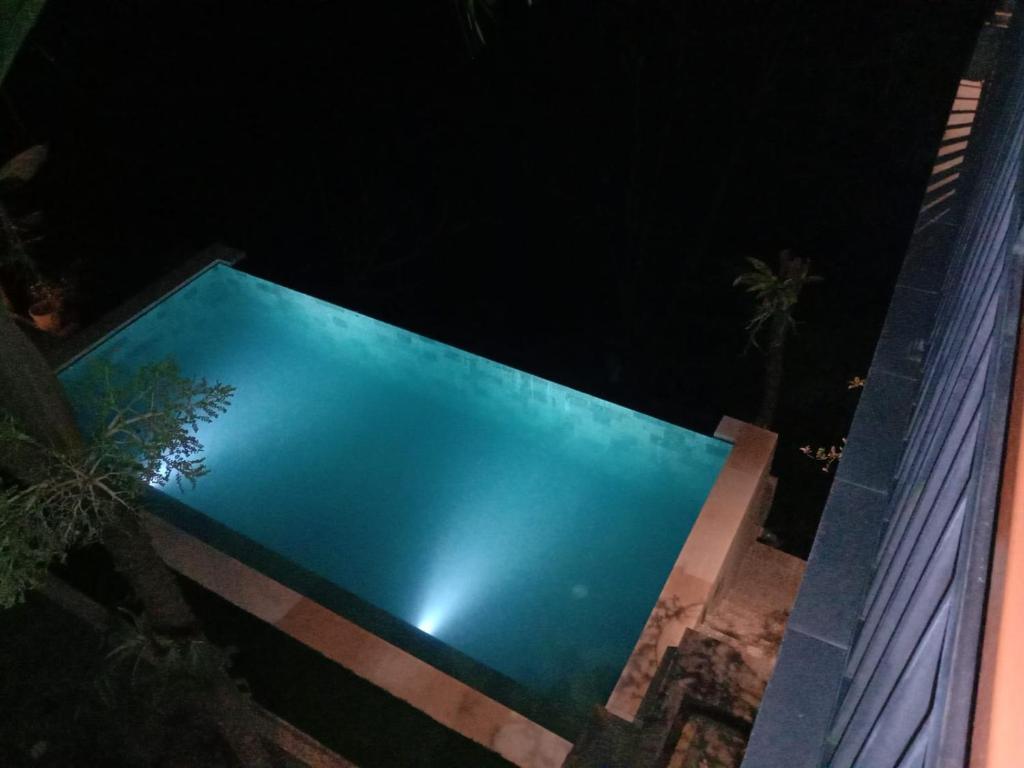 Bazén v ubytování Ketut Kasta Guest House nebo v jeho okolí