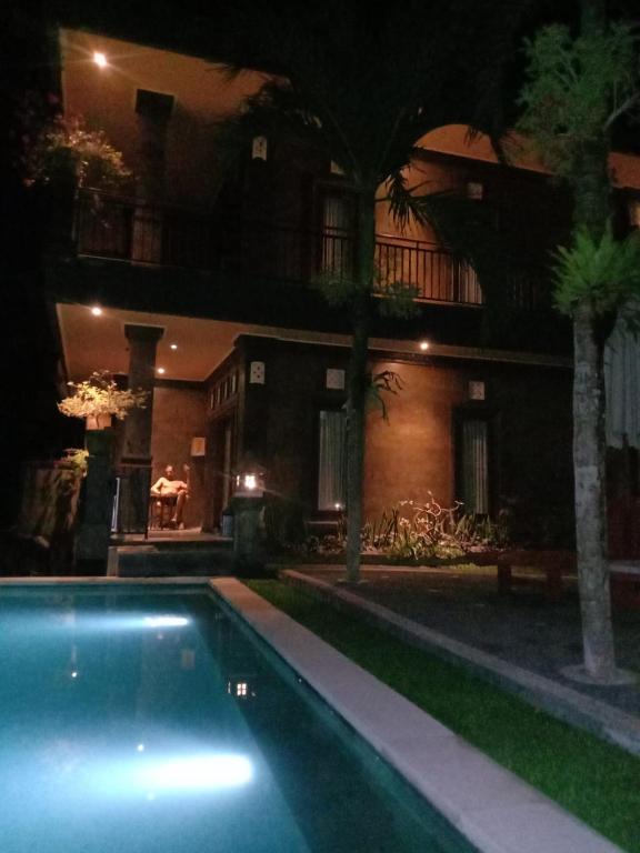 Bazén v ubytování Ketut Kasta Guest House nebo v jeho okolí