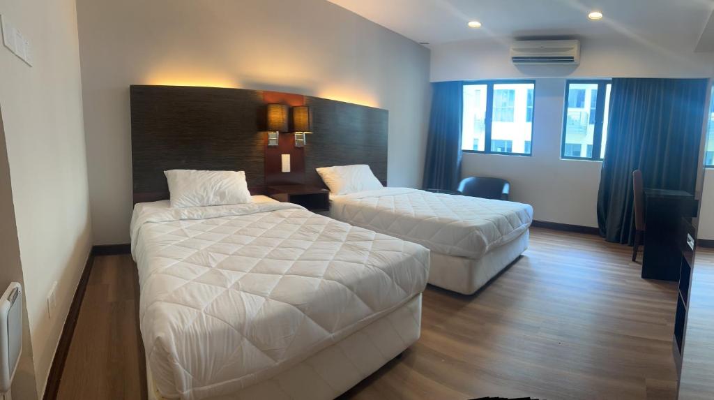 Postel nebo postele na pokoji v ubytování Deluxe Twin Room AYS