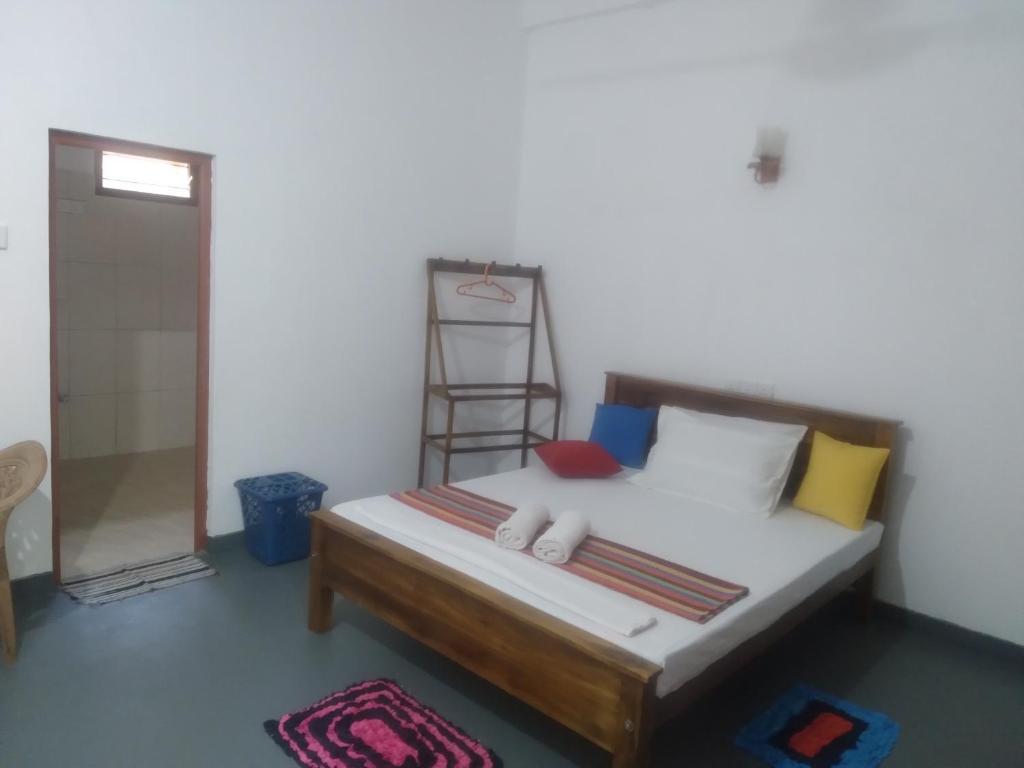 Postel nebo postele na pokoji v ubytování Family Nest