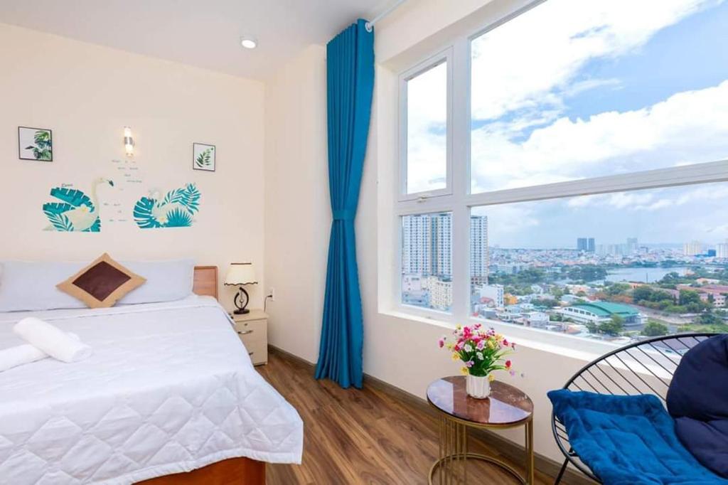 Postel nebo postele na pokoji v ubytování VUNG TAU GOLDSEA near Back Beach