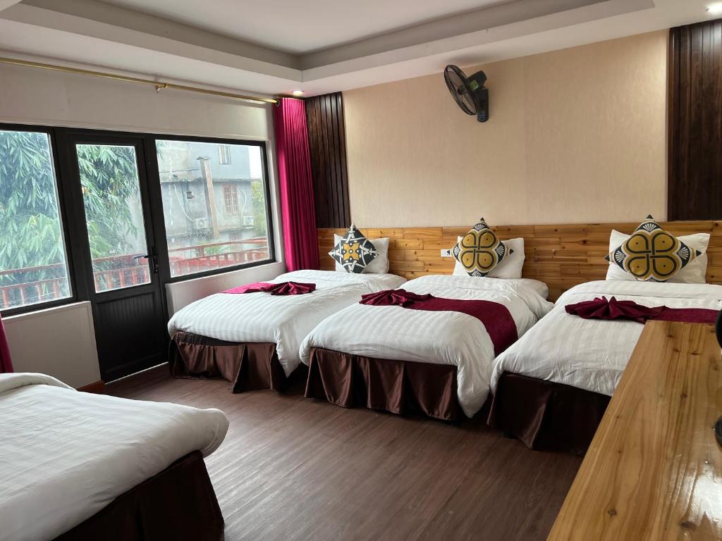 Postel nebo postele na pokoji v ubytování Dang Khoa Homestay