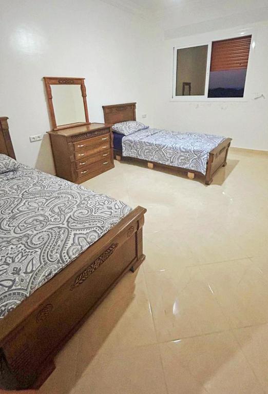 Postel nebo postele na pokoji v ubytování Apartamentos Beach Tahadart, Asilah