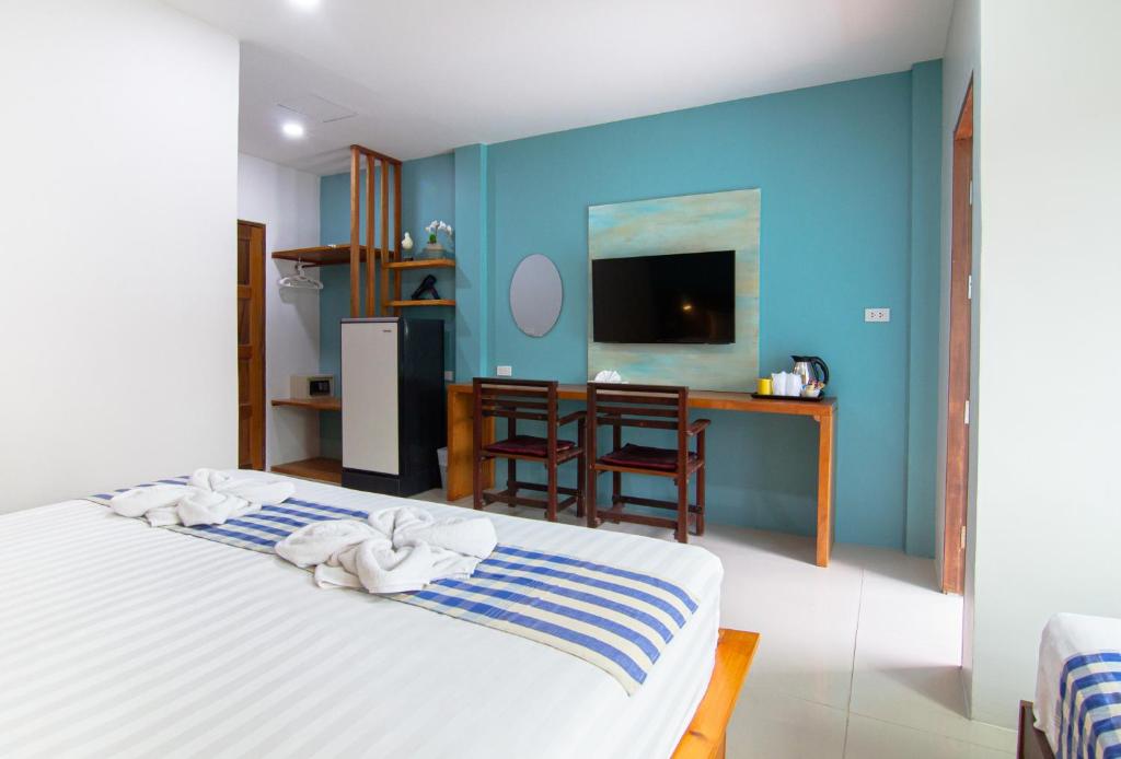 Postel nebo postele na pokoji v ubytování Kamala Beach Residence