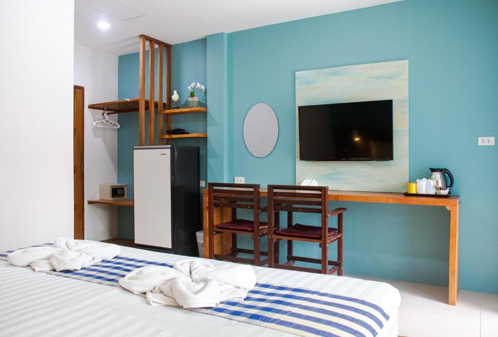 Postel nebo postele na pokoji v ubytování Kamala Beach Residence