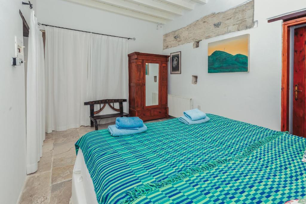 Postel nebo postele na pokoji v ubytování Archondia House - Holiday Apartments With Pool
