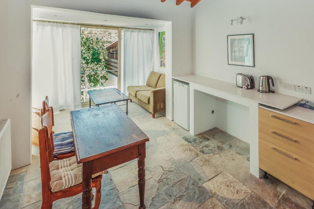Kuchyň nebo kuchyňský kout v ubytování Archondia House - Holiday Apartments With Pool