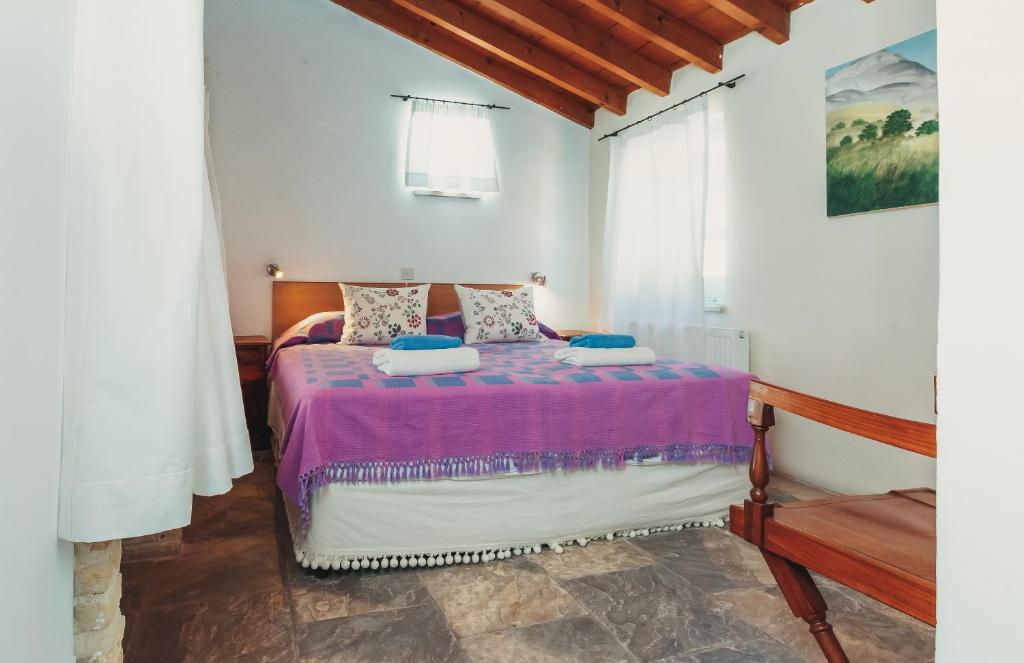 Postel nebo postele na pokoji v ubytování Archondia House - Holiday Apartments With Pool