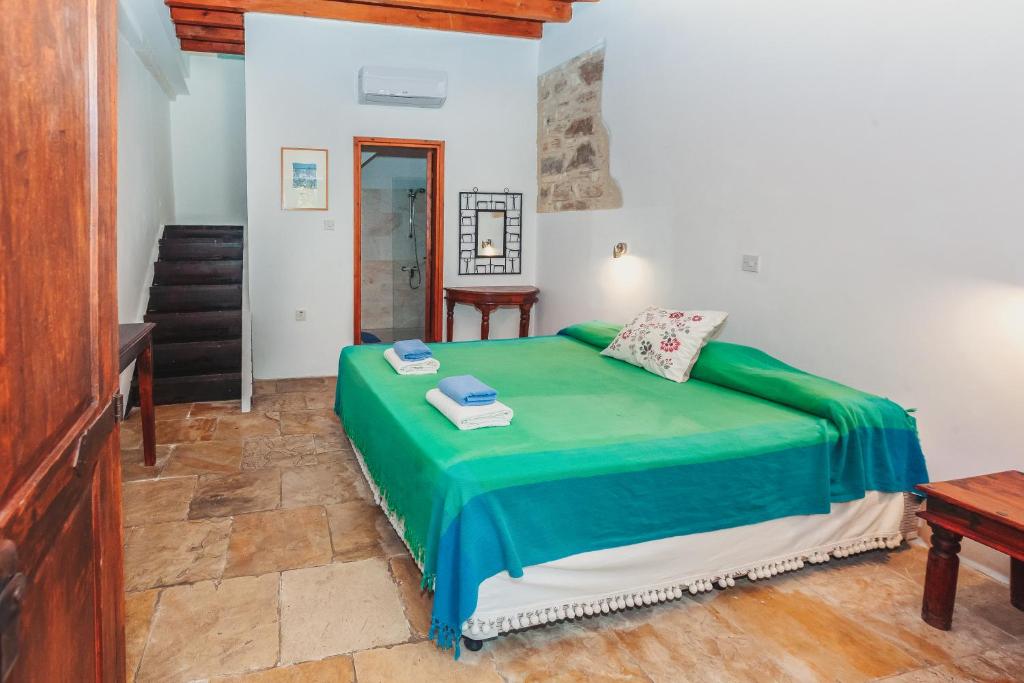 Postel nebo postele na pokoji v ubytování Archondia House - Holiday Apartments With Pool