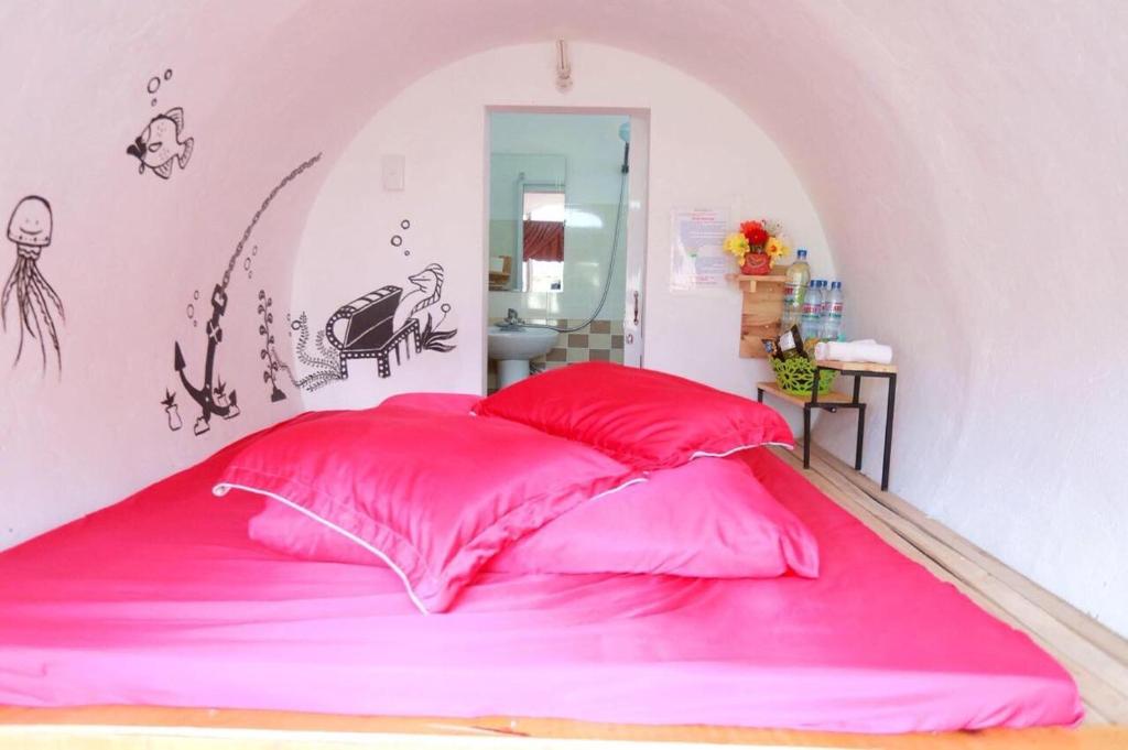 Postel nebo postele na pokoji v ubytování Mộc House
