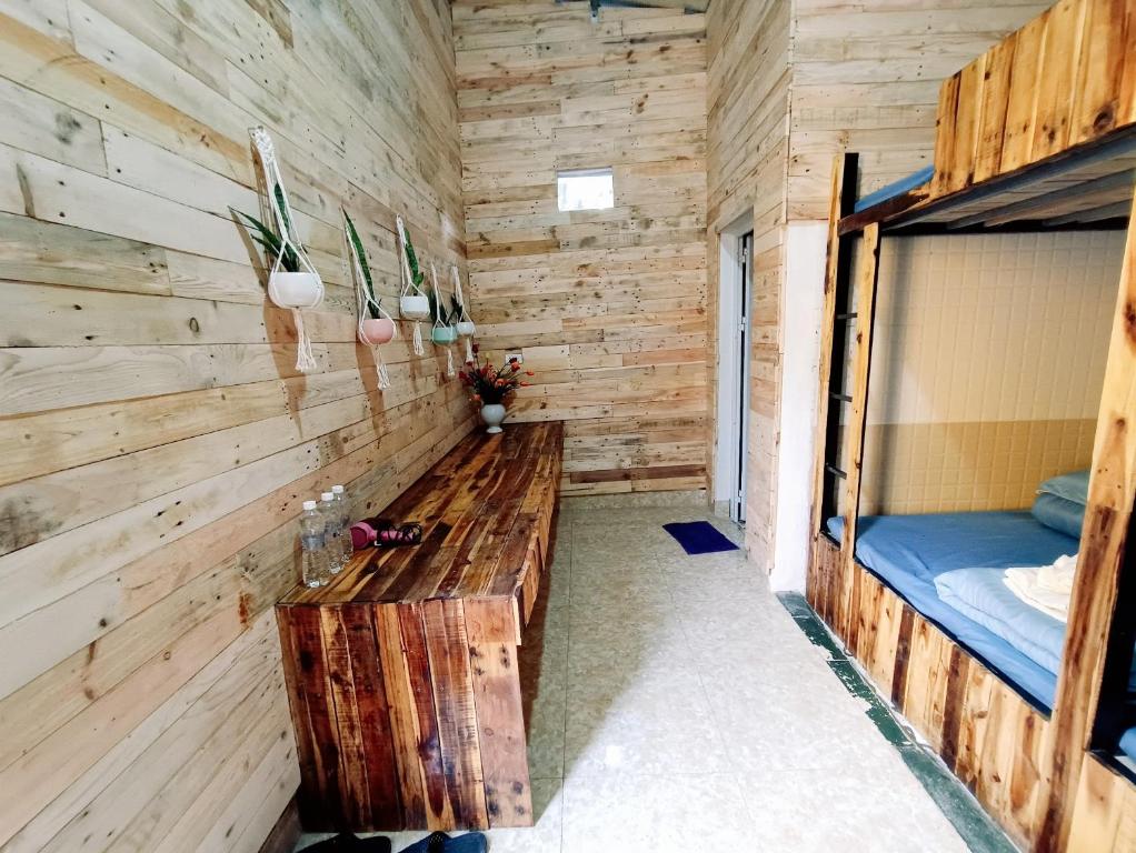 Postel nebo postele na pokoji v ubytování Mộc House