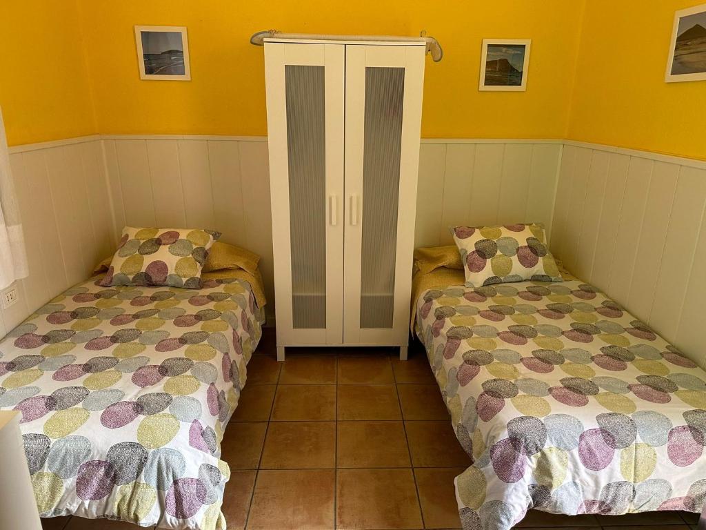 Postel nebo postele na pokoji v ubytování Casa El Picacho