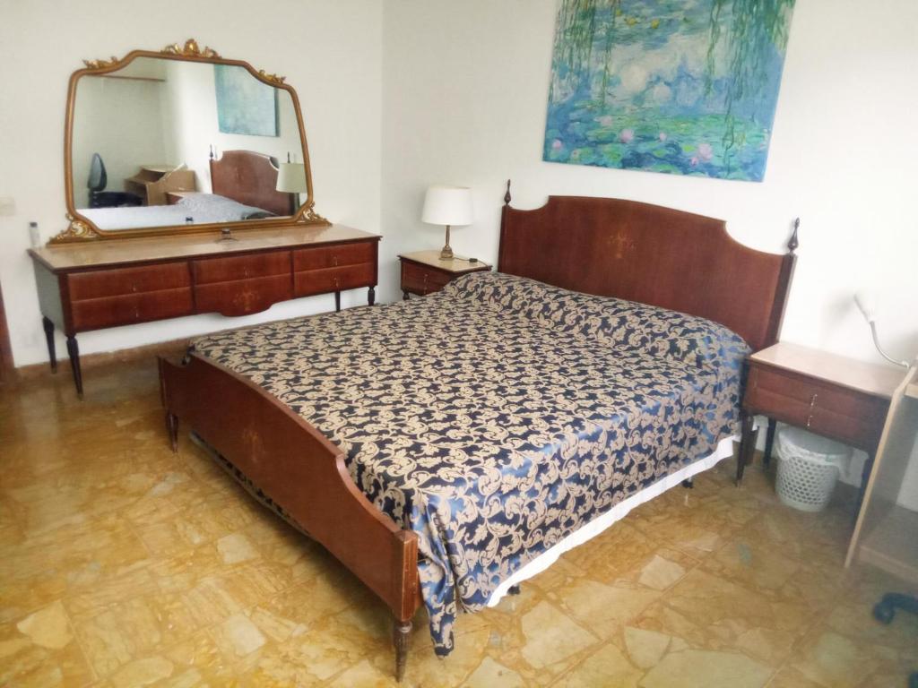 Posteľ alebo postele v izbe v ubytovaní Camera in stile Novecento