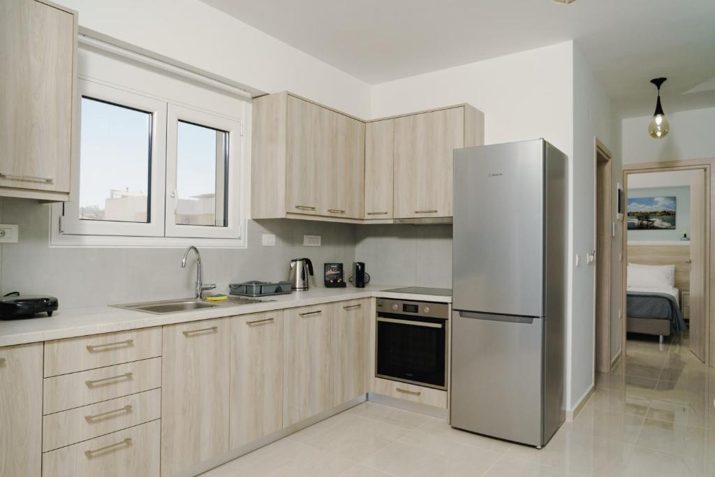 Kuchyň nebo kuchyňský kout v ubytování EDEL Luxury Apartments
