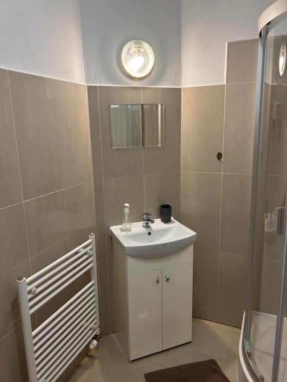 Kúpeľňa v ubytovaní Kondé Apartments C