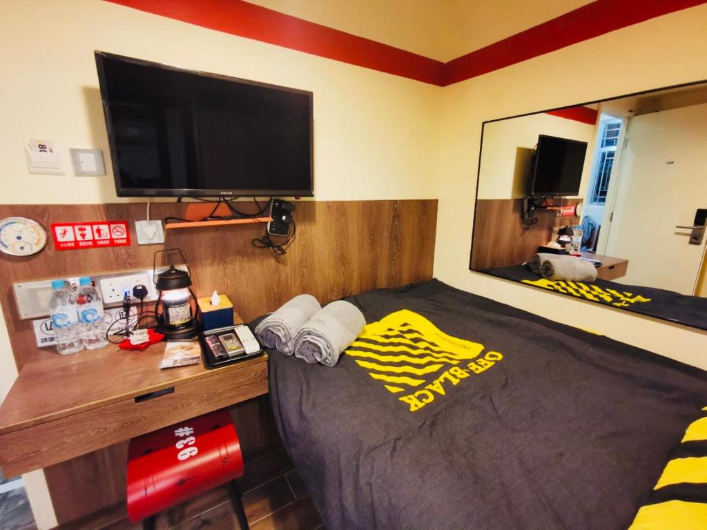 TV a/nebo společenská místnost v ubytování 香港九巴旅馆 KMB-Guesthouse