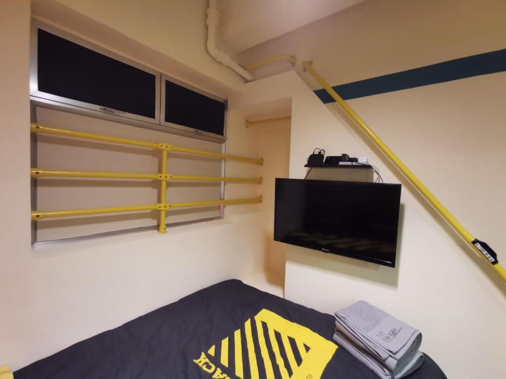 TV a/nebo společenská místnost v ubytování 香港九巴旅馆 KMB-Guesthouse