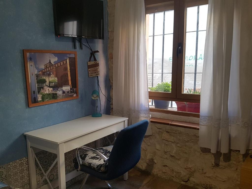 TV a/nebo společenská místnost v ubytování Habitación en Ocaña