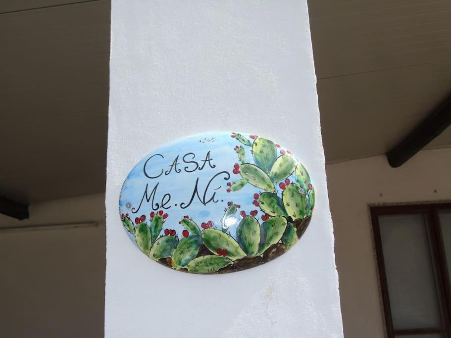 Una señal que me dice en una pared en Casa MeNi villetta con Piscina, en Scicli