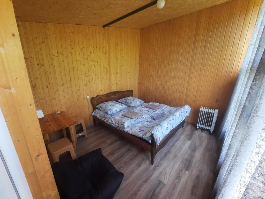 Postel nebo postele na pokoji v ubytování Mountain House in Juta