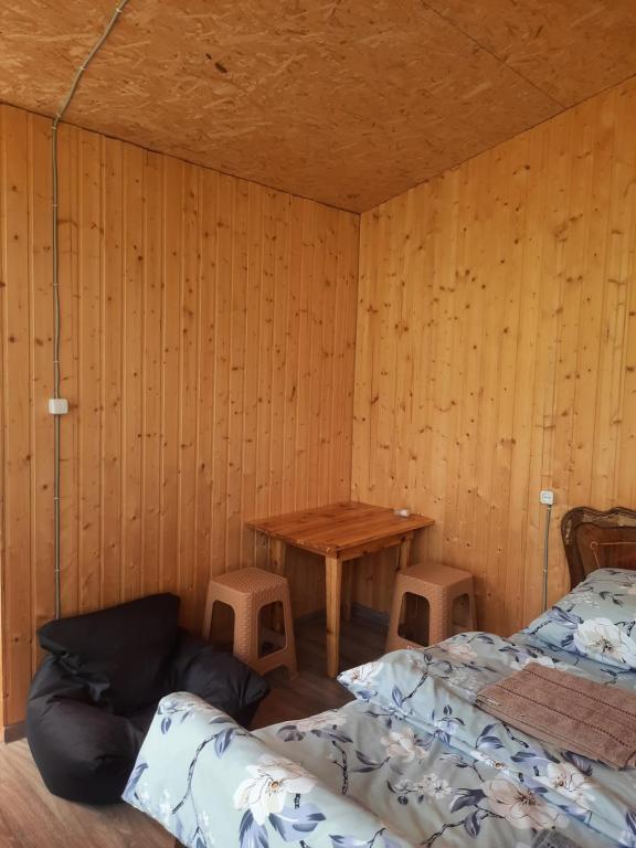 Postel nebo postele na pokoji v ubytování Mountain House in Juta