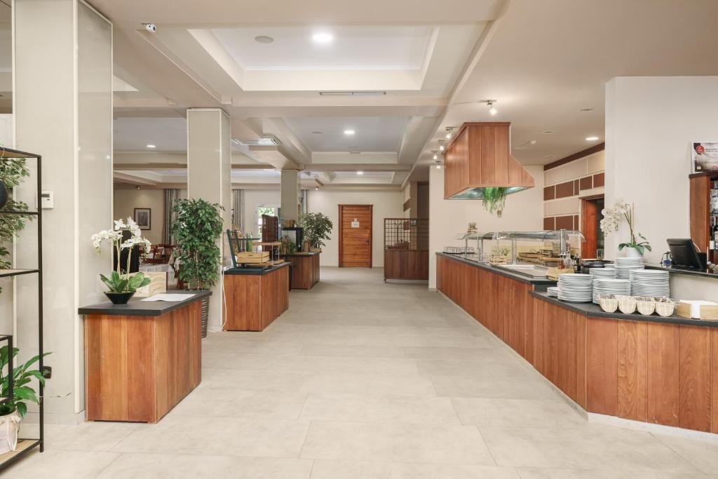 Kuchyň nebo kuchyňský kout v ubytování Hotel Vrata Krke