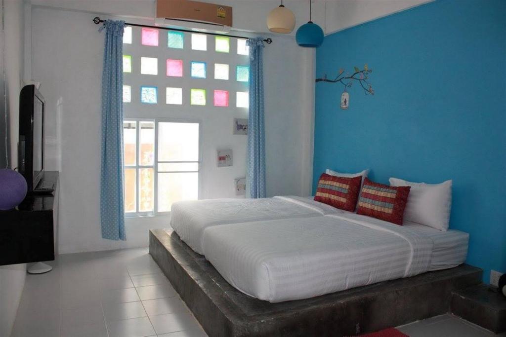 Postel nebo postele na pokoji v ubytování Na-Rak-O Resort
