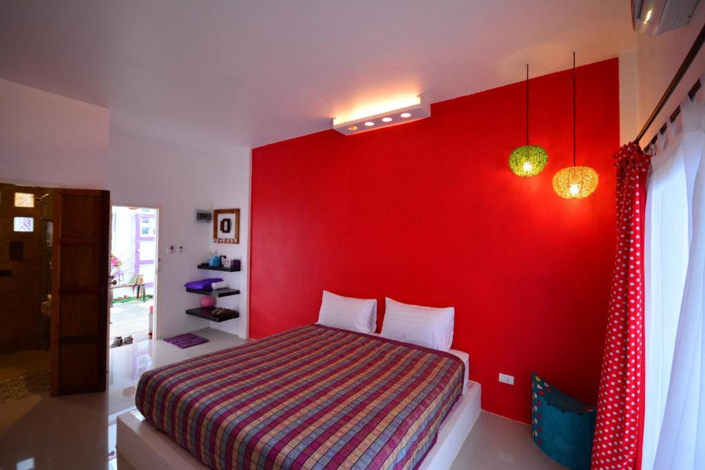 Postel nebo postele na pokoji v ubytování Na-Rak-O Resort