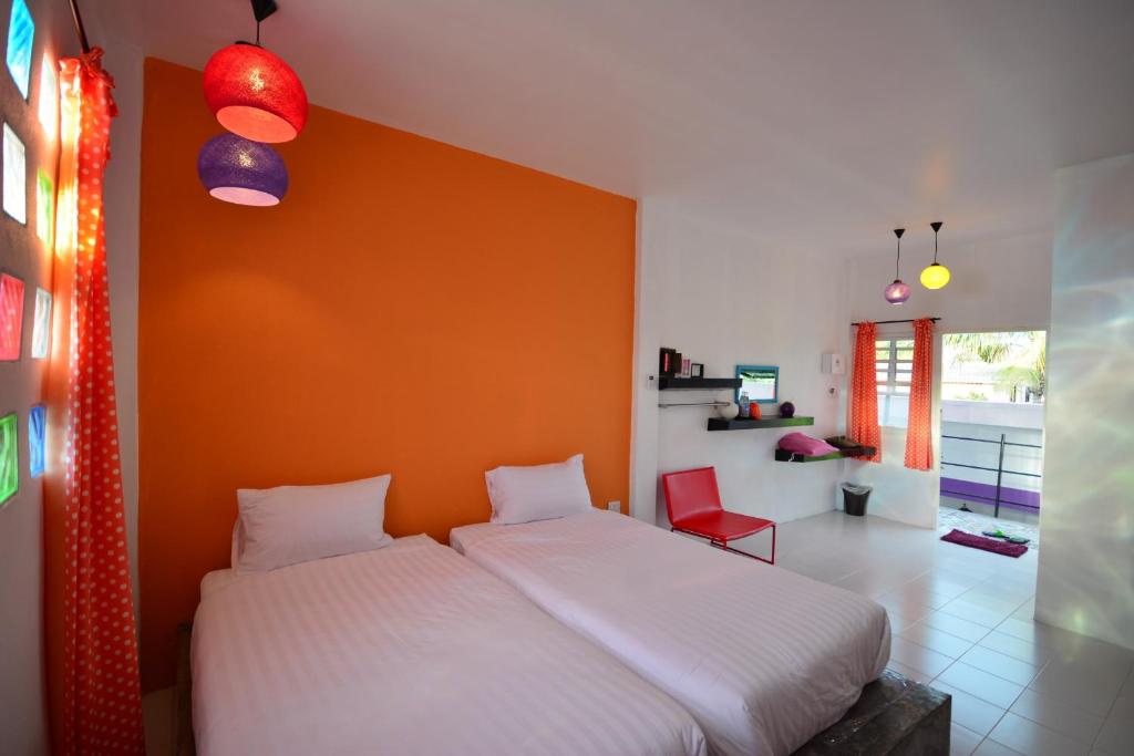 Postel nebo postele na pokoji v ubytování Na-Rak-O Resort