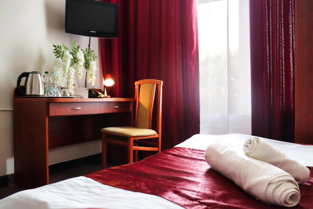 Posteľ alebo postele v izbe v ubytovaní Hotel Lothus