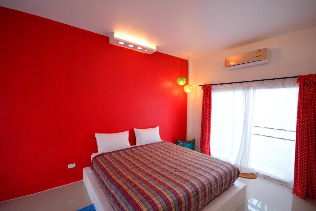 Postel nebo postele na pokoji v ubytování Na-Rak-O Resort