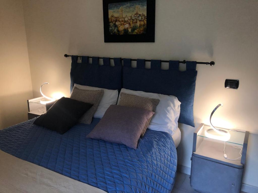 Postel nebo postele na pokoji v ubytování LA CASETTA