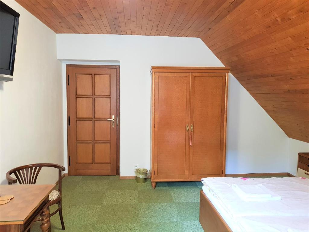 Postel nebo postele na pokoji v ubytování Chalupa pod strání
