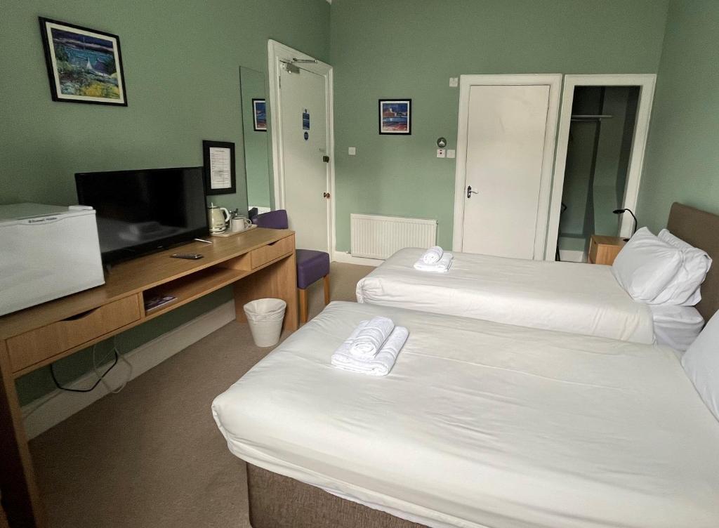 TV a/nebo společenská místnost v ubytování The Kelvin Hotel
