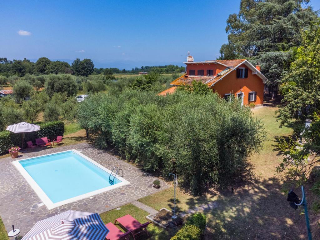 an aerial view of a house with a swimming pool at Holiday Home Podere Cerbaia - SMR100 by Interhome in Santa Maria a Monte
