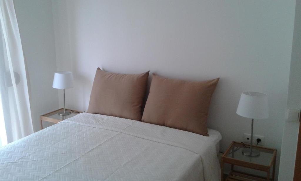Postel nebo postele na pokoji v ubytování Aetofolia Stella Villas