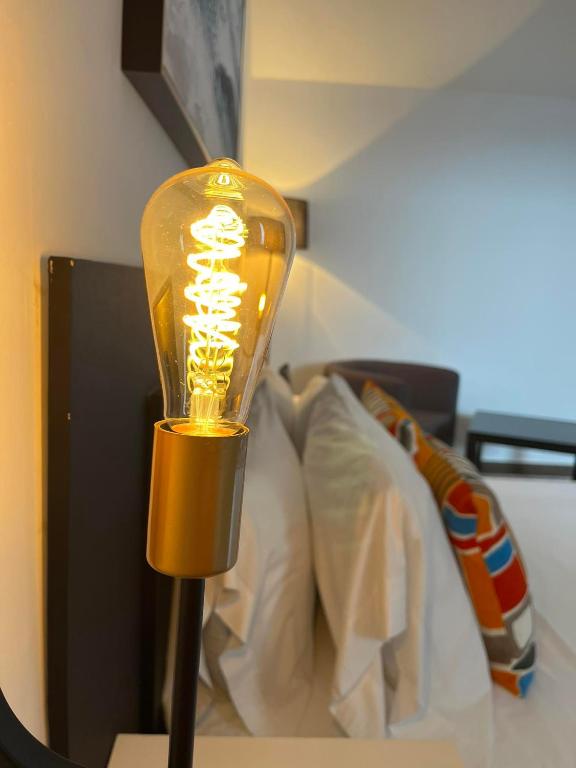 Postel nebo postele na pokoji v ubytování Fogo Boutique Hotel