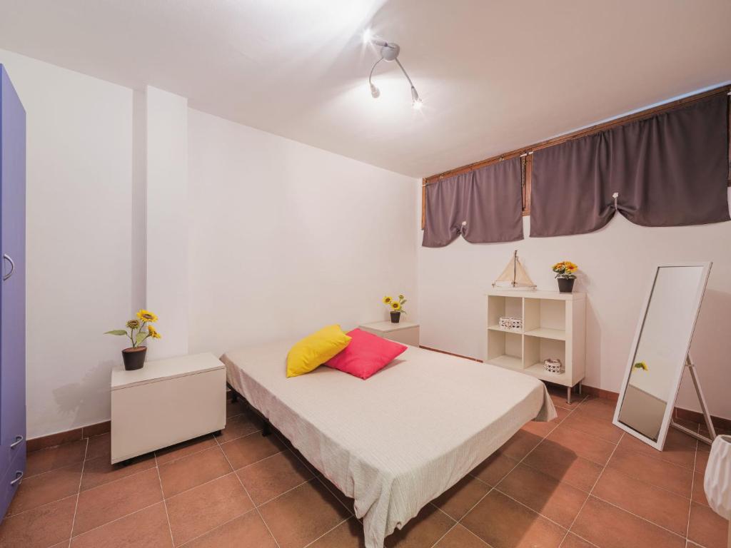 A bed or beds in a room at Apartment Villaggio 5 Terre-4 by Interhome