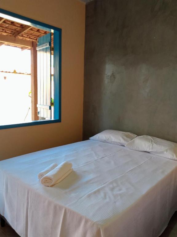 Postel nebo postele na pokoji v ubytování Pousada Pérola do Rio