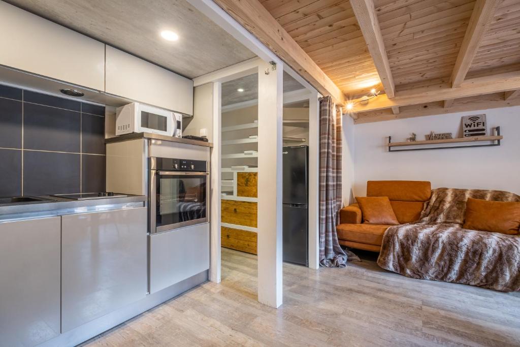 Kuchyňa alebo kuchynka v ubytovaní Grand Roc A - 3 bedrooms Apartment Next to skilift - By Cozee Rentals