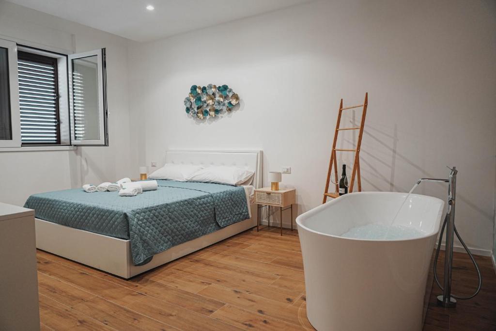 Postel nebo postele na pokoji v ubytování Casa Vacanza Stomar
