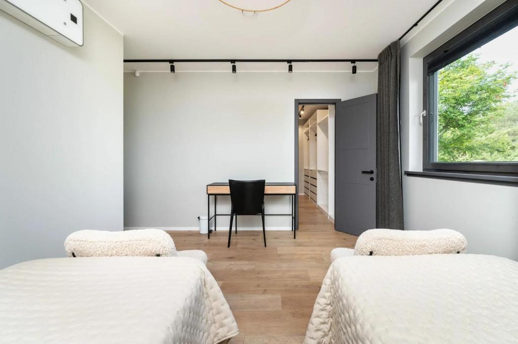 Postel nebo postele na pokoji v ubytování Serenity Villa