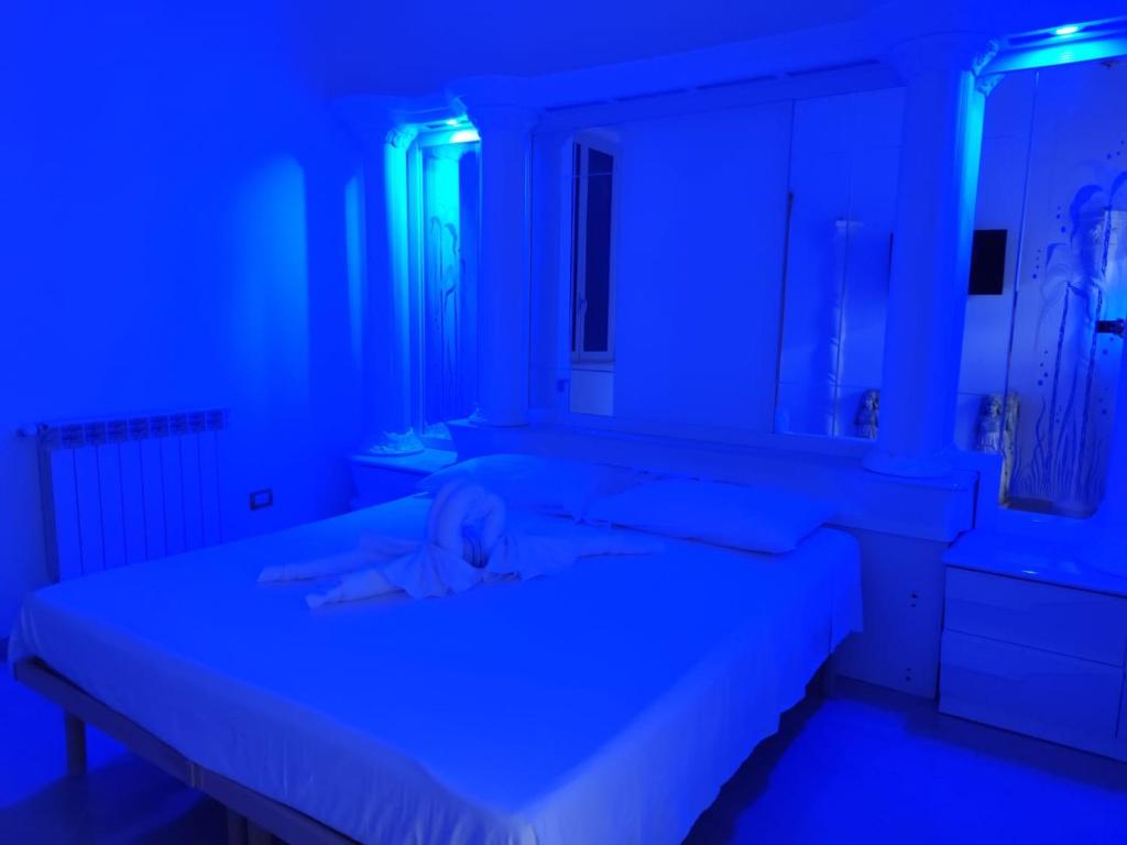 Postel nebo postele na pokoji v ubytování B&B IL TEMPIO