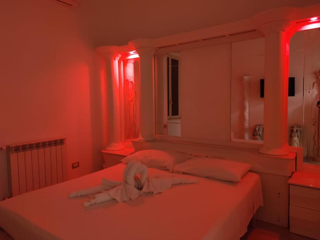 Postel nebo postele na pokoji v ubytování B&B IL TEMPIO