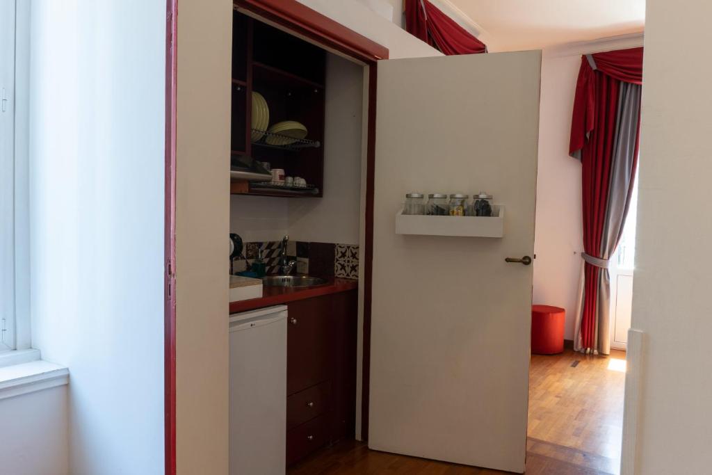 A kitchen or kitchenette at Residenza Romana