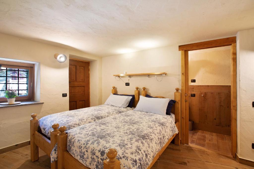 Postel nebo postele na pokoji v ubytování Chalet 1175 - Grand-haury