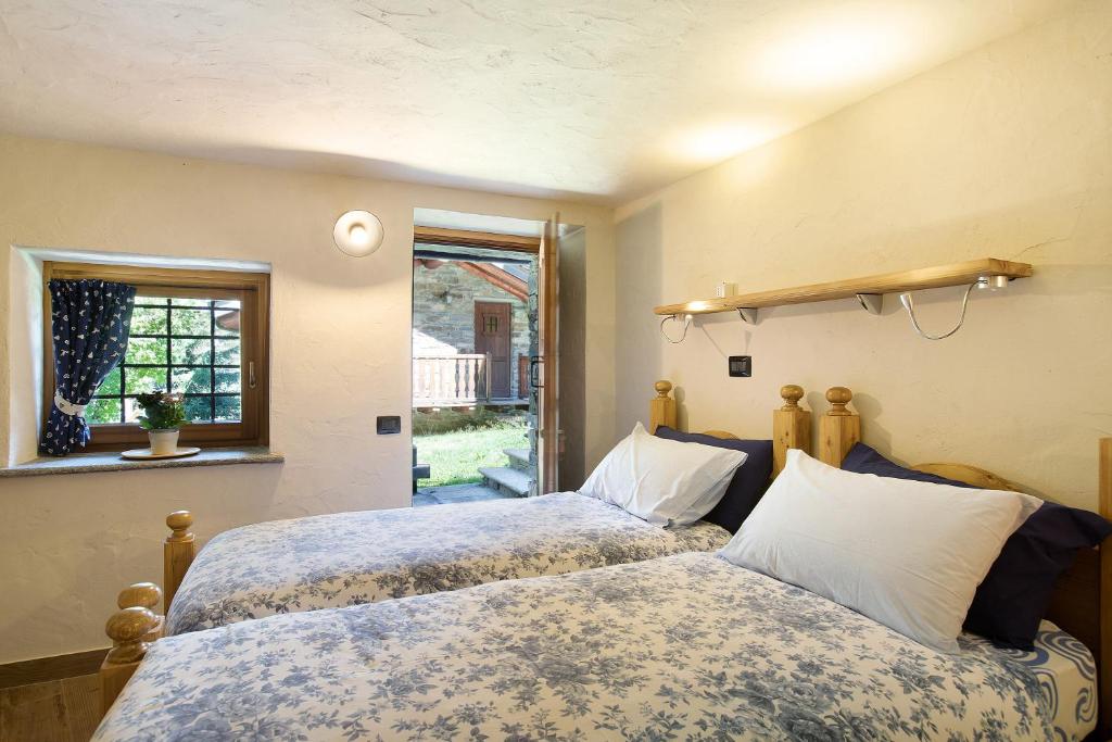 Postel nebo postele na pokoji v ubytování Chalet 1175 - Grand-haury