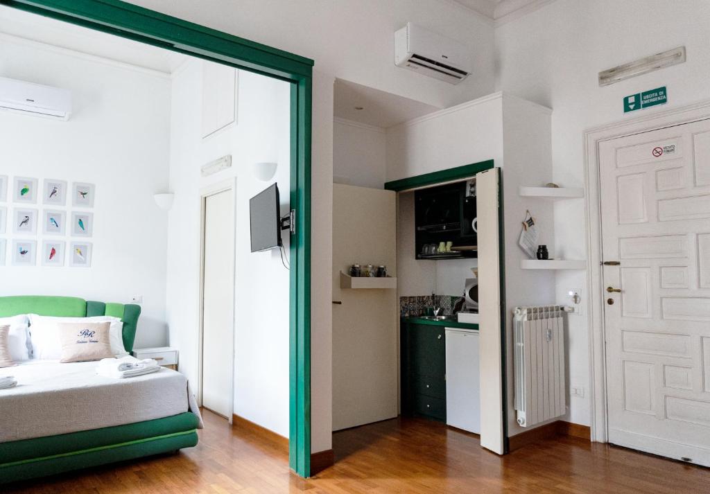 A bed or beds in a room at Residenza Romana
